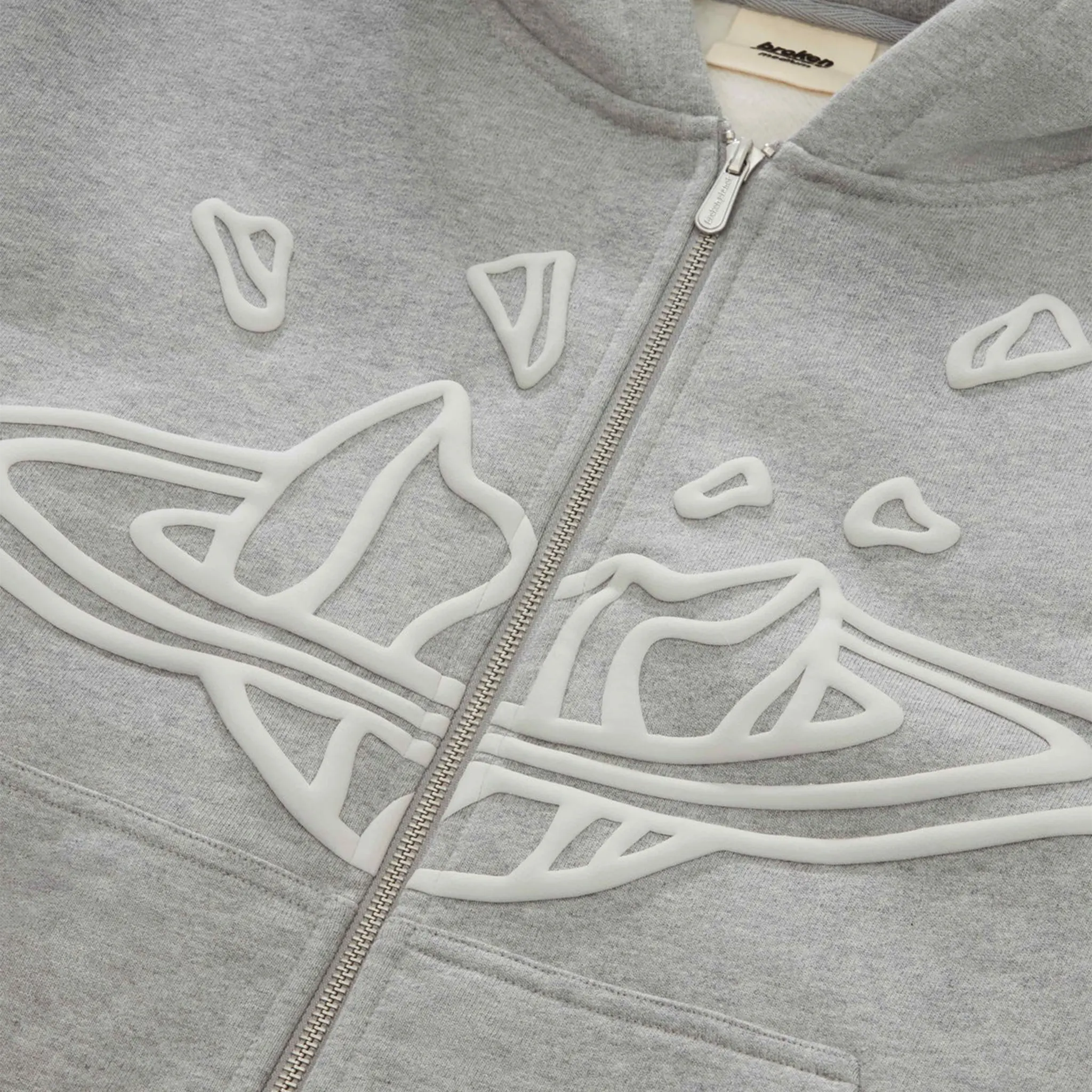 Logo view of Broken Planet Zip-Up Heather Grey Hoodie